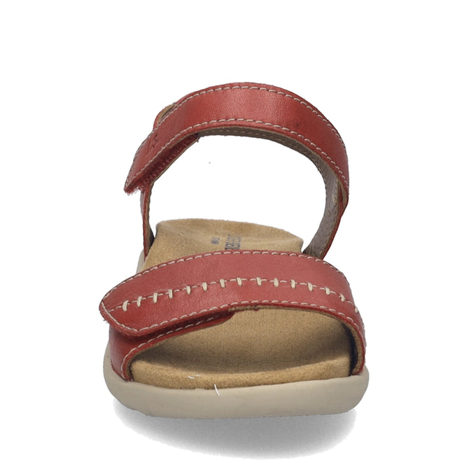 A front view of the Josef Seibel Juliet 03 Women’s Leather Comfort Sandal highlights its bold red leather with contrasting white stitching, crafted for women who appreciate fashionable sandals. Designed with two adjustable straps and a tan cushioned footbed, this sandal combines comfort and style on a flat, light-colored sole.