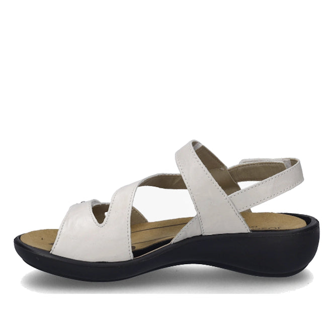 A left side profile of the Josef Seibel Ibiza 70 Women’s Leather Comfort Sandal in white, featuring an open toe, side cutouts, a secure ankle strap, and a contrasting low black sole—an ideal choice for women seeking stylish and comfortable sandals., 4062838862096, 4062838862102, 4062838862119, 4062838862126, 4062838862133, 4062838862140
