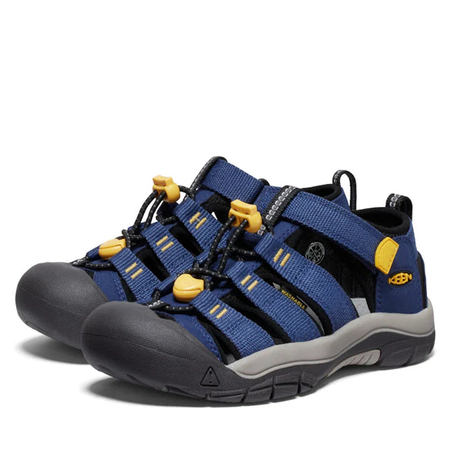 Introducing the Keen Kids Newport H2 in Blue Naval Academy/Yellow (available in US sizes 8 toddlers to 6 youths): These hardwearing outdoor sandals feature blue and black uppers accented with yellow details, rugged grippy non-marking soles for hiking or water activities, protective rubber toe caps, adjustable elastic laces, and a convenient Velcro closure for a secure and customized fit.
