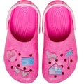 Top down view of a pair of pink barbie children's clogs with cartoon designs  and jibbitz on a white background,
198445228865,
198445228872,
198445228889,
198445228896,
198445228902,
198445228919,