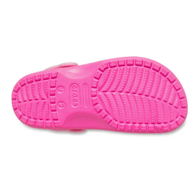 Pink crocs sandal with textured sole on a white background,
198445228865,
198445228872,
198445228889,
198445228896,
198445228902,
198445228919,