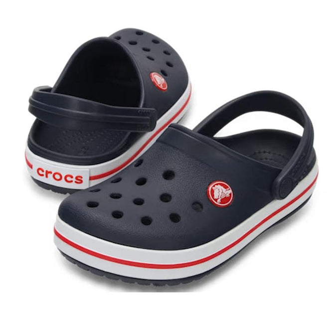 Kids Crocs Crocband Navy blue and white Crocs clogs with red accents on a white background and no holes around the side of the clog.,
