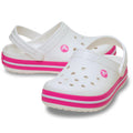 Crocs Kids Crocband White clogs with pink stripes on a white background. Feature no holes around the toe area
