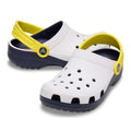 both feet kids crocs White and navy clogs with yellow straps on a white background,
198445163890,
198445163906,
198445163913,
198445163920,
198445163937,
198445163944,
198445163951,