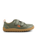 The Bobux KP Kids Plus Dawn Leather Sneaker in Vetiver Green is a child’s shoe crafted from green leather, featuring two Velcro straps, a brown rubber sole, and orange accents such as the pull tab and logo. Designed to support natural foot movement with its wide toe box, these barefoot kids sneakers are displayed in a side view against a white background.