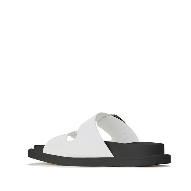 The Los Cabos Womens Slide Ando with Arch Support in White features wide crisscross straps, an open toe, a thick flat black sole, and a cushioned footbed for comfort, shown in side profile on a plain white background., 9321191051901, 9321191051918, 9321191051925, 9321191051932, 9321191051949, 9321191051956