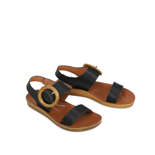 The Los Cabos Damas Black Light Flexible Sandal Jandal features black cross-over leather straps, a tan cushioned footbed, light brown soles, and large round gold buckles on the side straps., 39784, 9321191213002, 9321191213019, 9321191213026, 9321191213033, 9321191213040, 9321191213057