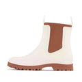 The Los Cabos Amelia Cream Ankle Rain Boot Waterproof features brown elastic side panels, a brown pull tab, treaded sole, and practical neoprene lining for style and comfort. Shown in profile against a plain background., 9321190004977, 9321190004984, 9321190004991, 9321190005004, 9321190005011, 9321190005028, 50794
