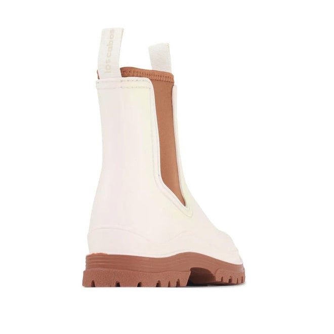 The Los Cabos Amelia Cream Ankle Rain Boot Waterproof is shown from a back side angle, featuring a chunky brown sole, tan side panels, and front and back pull tabs against a white background., 9321190004977, 9321190004984, 9321190004991, 9321190005004, 9321190005011, 9321190005028, 50794