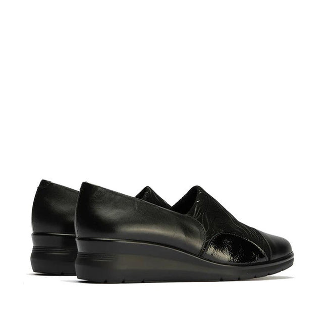Pitillos Womens Lycra and Patent Leather Shoe 10731—a pair of black slip-on wedge shoes with matte lycra and glossy patent leather finishes, removable innersole, shown from the back and side on a white background., 8445191655554, 8445191655561, 8445191655578, 8445191655585, 51923, 51924