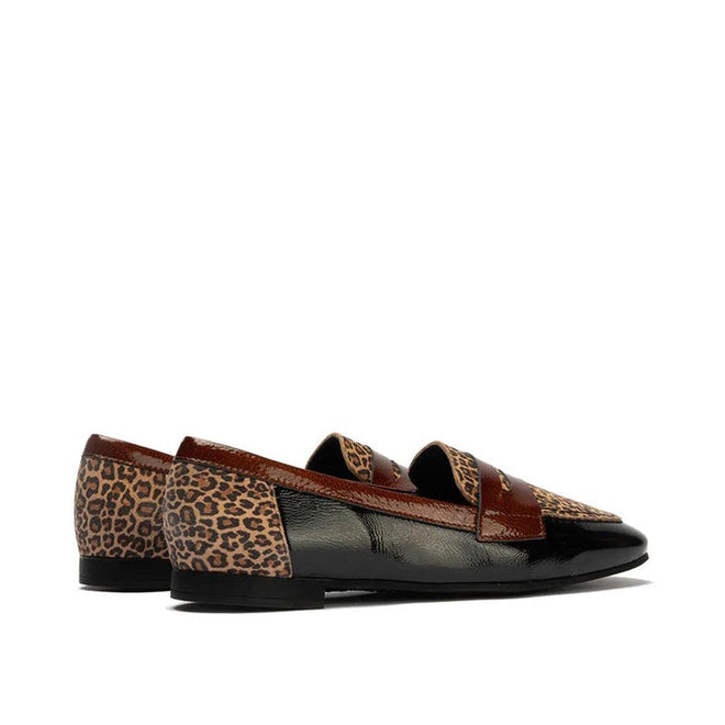 The Pitillos Womens Black Flat Patent Loafer Moccasin 10870 features glossy black patent panels, brown leather trim and straps, and leopard print accents, shown against a white background., 8445191690432, 8445191690449, 8445191690456, 8445191690463, 51917, 51918