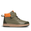 The Pretty Brave Hi Top Boot Corey Olive is a kids’ olive green leather high-top with a tan sole, orange ankle collar, hook-and-loop strap, laces, and heel pull tab, shown in profile facing right on a white background.