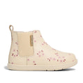 The Pretty Brave Charlie Leather Boot First Walkers Winter Bloom Pink is a cream leather Chelsea boot for children, featuring side elastic panels and small pink floral prints, shown on a white background.