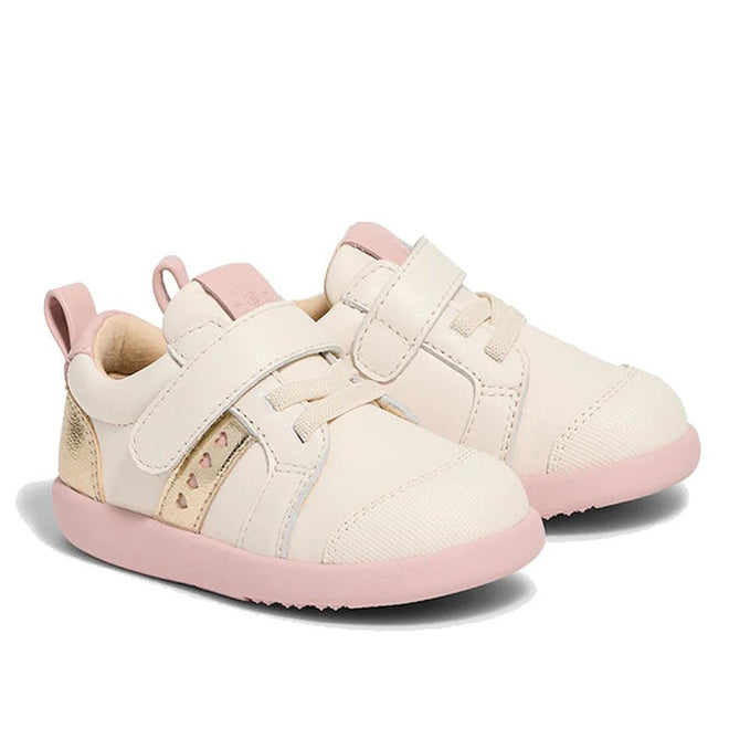 The Pretty Brave SID Leather Trainer First Walker in Off White Stone Pink are toddler shoes with cream uppers, light pink soles, Velcro straps, elastic laces, and gold and pink heart accents on the sides., 9420075362963, 9420075362956, 9420075362949, 9420075362932