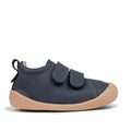 The Pretty Brave First Walker Toto Leather Trainer in Indigo Blue is a dark blue, flexible baby shoe with two Velcro straps and a light brown rubber sole, displayed in profile on a white background., 9420075366275, 9420075366268, 9420075366251, 50971