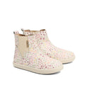 The Pretty Brave Electric Leather Boot - Secret Garden is a kids’ ankle boot in genuine leather, featuring a cream background with a pastel pink, yellow, and green floral pattern, elastic side panels, and back pull tabs.