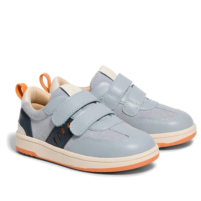 The Pretty Brave River Bolts Leather Trainer Blue Grey features light blue and gray leather, orange accents, white soles, and double hook-and-loop straps—perfect sporty shoes for active kids., 9420075363984, 9420075363977, 9420075363960, 9420075363953, 50510, 50511, 50512, 50513, 50514, 50515, 9420075363984, 9420075363977, 9420075363960, 9420075363953, 9420075363946, 50511, 50512, 50513, 50514, 50515