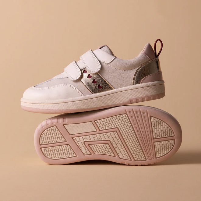 Two Pretty Brave River Hearts Leather Trainer sneakers in Pink Off White are shown. One stands upright, the other lies on its side to reveal the textured sole. Both feature light pink leather and velcro straps on a beige background., 9420075363854, 9420075363847, 9420075363830, 9420075363823, 9420075363816, 9420075363809, 50502, 50503, 50504, 50505