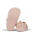 The image shows two Pretty Brave First Walker Toto Leather Trainers in Dusky Pink for toddlers: one upright and one on its side, revealing "PRETTY" near the heel and a sole with wavy grip lines and a circular logo., 9420075366329, 9420075366312, 9420075366305, 50976