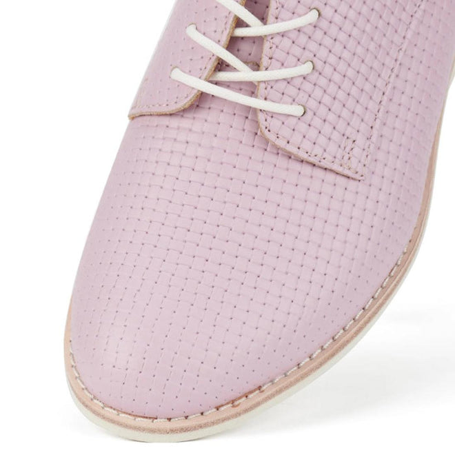 Close-up of the toe of Rollie Derby Embossed pink textured shoe with white laces on a white background.,
9781760778514,
9781760778538,
9781760778552,
9781760778484,
9781760778507,, 46062, 9781760778514, 9781760778538, 9781760778552, 9781760778484, 9781760778507
