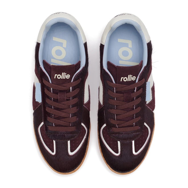Top view of the Rollie Womens Pace Dark Cherry Bone Suede Sneaker, featuring maroon suede upper, brown laces, light blue insoles with "rollie" branding, and white detailing on the toe and sides., 9339554000315, 9339554000317, 9339554000164, 9339554000056, 9339554000182