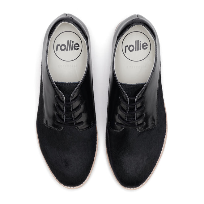 The Rollie Womens Derby Black Splice Leather Brogue Shoe features a polished black lace-up design, white outsoles, visible Rollie insoles branding, and an orthotic-friendly removable footbed for comfort., 51190, 9339554014920, 9339554054292, 9339554007458, 9339554000329, 9339554389769