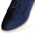 Close-up of the front part of the Rollie Womens Derby Navy Velvet Brogue Shoe, showcasing light stitching, a beige sole, and lace-up design., 9339554000046, 9339554035741, 9339554028743, 9339554006123, 9339554009810