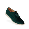 Rollie Womens Derby Emerald Velvet Brogue Shoe, style SC02101, features dark green velvet, lace-up design, tan leather interior, and white sole, displayed at a slight angle on a white background.