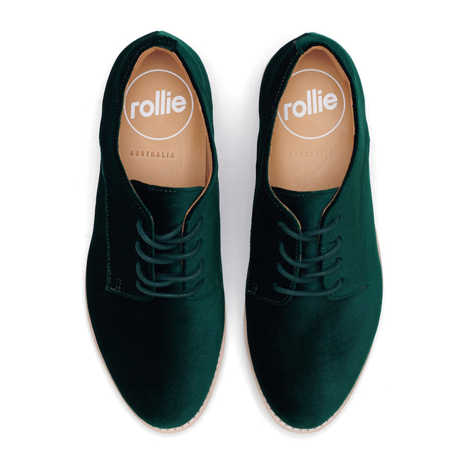 A pair of Rollie Womens Derby Emerald Velvet Brogue Shoes, style SC02101, with tan insoles labeled "rollie AUSTRALIA," shown from above on a white background., 9339554068114, 9339554005690, 9339554000077, 9339554000336, 9339554023830
