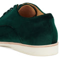 Close-up of the heel and side of the Rollie Womens Derby Emerald Velvet Brogue Shoe, showcasing its dark green velvet upper, white sole, tan leather interior, neat stitching, and smooth finish., 9339554068114, 9339554005690, 9339554000077, 9339554000336, 9339554023830