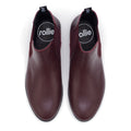Top view of a pair of Rollie Womens Chelsea Dark Cherry Leather Ankle Boots with black soles, black insoles featuring Rollie branding, and pull tabs at the back., 9339554019543, 9339554104898, 9339554094687, 9339554000190, 9339554073989