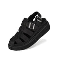 Right out foot and front view Rollie Hyde Fisherman Black sandal with multiple straps and buckles on a white background.