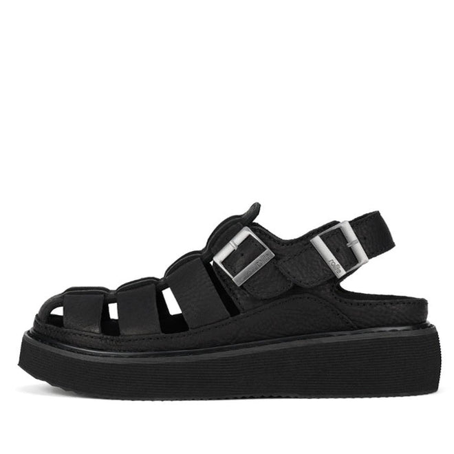 Rollie Hyde Fisherman Black sandal side view showing buckles around heel and over the top of the foot with buckle straps on a white background.,
9781760788858,
9781760788865,
9781760788872,
9781760788889,
9781760788896,