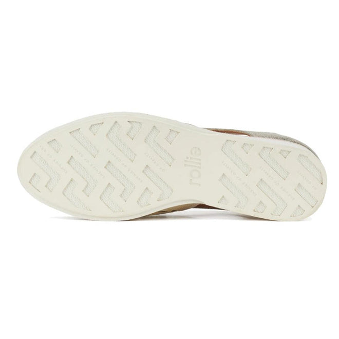 The image shows the sole of the Rollie Womens Sidecut Boho Punch Gold Leather Shoe, featuring a white rubber bottom with a geometric zigzag tread and "elliot" embossed in the center—complementing its stylish Boho look., 9381760798811, 9381760798828, 9381760798835, 9381760798842, 9381760798859