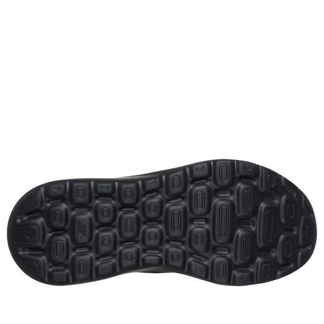 Close-up of the black textured sole on the Skechers Womens Slip In Go Walk Arch Fit N-Joy Black, featuring raised oval grips and indentations for traction with Arch Fit support., 199025170253, 49932, 199025170277, 49934, 199025170291, 49936, 199025170314, 49938, 199025170338, 199025170352