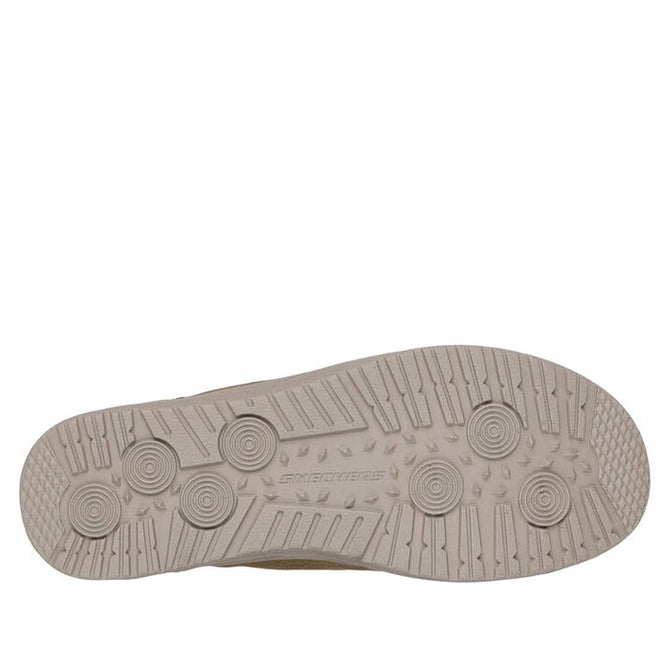 The image shows the beige rubber sole of the Skechers Mens Slip Ins Melson - Classy Moc Tan, featuring circular tread patterns, straight grooves, small nubs, and "Skechers" embossed in the center., 198376452049, 198376452056, 198376452063, 198376452070, 198376452087, 198376452094, 198376452100