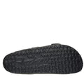 The image shows the black rubber sole of the Skechers Womens Arch Fit Foamies Cali Breeze Gold Star Slide, featuring raised clover shapes and an embossed Skechers logo—ideal for those wanting cushioned footbed sandals., 49587, 197627436340, 197627436357, 197627436364, 197627436371, 49592, 49593