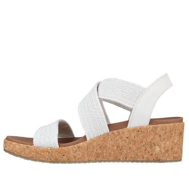 The Skechers Womens Arch Fit Beverlee Love Stays White Wedge Sandal features woven fabric straps, an open toe, medium cork wedge heel, slingback design, and a plush memory foam footbed for comfort., 49607, 195969731529, 195969731543, 195969731567, 195969731581, 195969731598