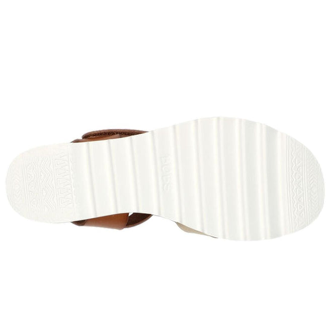 The image shows the bottom view of the Skechers Bobs Womens Desert Kiss Hi Divine Garden Champagne Tan sandal, featuring a white, ridged sole with subtle geometric patterns on the heel area., 195969581407, 40918, 195969581414, 40920, 195969581421, 40922, 195969581438, 195969581445, 40925