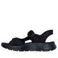 The Skechers Mens Go Walk Flex SD Easy Entry Slip In Sandals Black are lightweight, sporty slip-in sandals with a thick textured sole, open toe, adjustable and heel straps—designed for comfort, support, and mobility., 48219, 48220, 48221, 198376833930, 198376833947, 198376833954, 48225