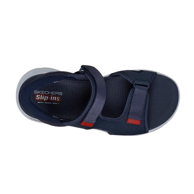 Top view of Skechers Mens Go Walk Flex SD Easy Entry Slip In Sandals in navy, featuring an open toe, front hook-and-loop strap with red accents, and a white sole with a textured footbed for comfort., 48226, 48227, 48228, 198376834012, 198376834029, 48231, 48232
