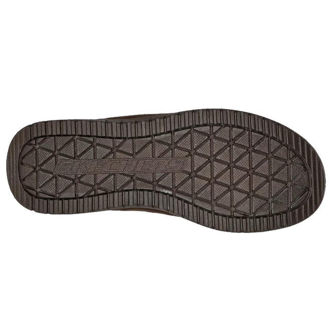 The image shows the bottom view of a Skechers Men's Relaxed Fit: Murette - Garvanza Slipper Scuff in Chocolate Brown, featuring a textured, diamond-shaped tread and ridged edges for grip., 52028, 52029, 196311210495, 196311210501, 52032, 196311210518