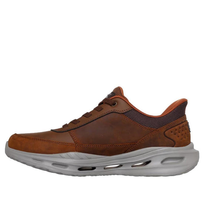 The Skechers Go Walk Men's Arch Fit Orvan Moxley Slip-Ins Hands Free Shoe in brown features mesh ankle detail, a slip-in design, white sole with air-cushion holes and textured accents, plus Arch Fit support for comfort., 48808, 48809, 198376510428, 48811, 198376510442