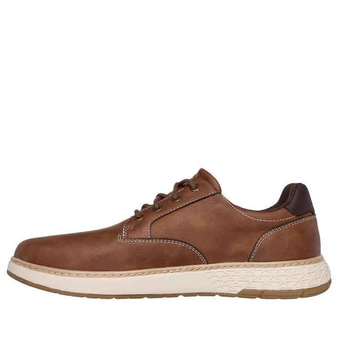 The Skechers Men's Wide Width Garlan Pryor is a waterproof slip-on trainer in brown, designed with Relaxed Fit comfort, white stitching, and a thick off-white textured sole., 52100, 52101, 198376435479, 198376435493, 198376435516