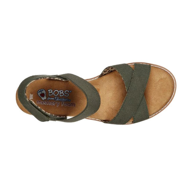 A top view of the Skechers Bobs Womens Desert Kiss Secret Picnic Wedge Sandal in olive, featuring crisscross fabric straps, an ankle strap, and a tan cushioned Memory Foam footbed., 194428807249, 194428807256, 194428807263, 194428807270, 194428807287, 40840, 194428807300, 194428807317, 194428807225, 194428807201