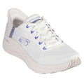 The Skechers Arch Fit 2.0 Slip In Spotted Grace White Blue features a white mesh upper, blue accents, leopard print details on heel and toe, hands-free slip-in design, convenient laces, and supportive Arch Fit comfort.