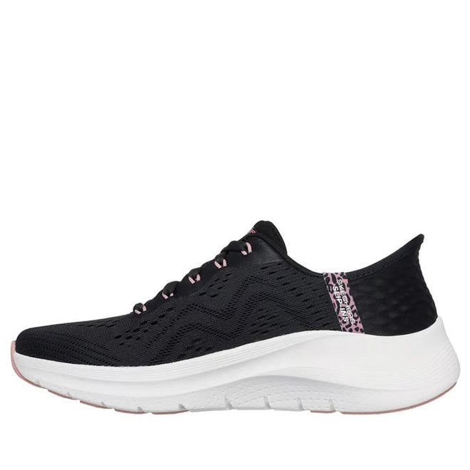 The Skechers Arch Fit 2.0 Slip In Spotted Grace Black Multi is shown from the left side, featuring a black breathable mesh upper, white sole, patterned pink and black accents on the tongue and heel, and black laces with pink details., 199025299961, 48851, 199025299985, 48853, 199025300001, 48855, 199025300025, 48857, 199025300049, 199025300063