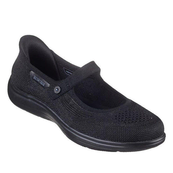 The Skechers Slip In Mary Jane Shoe On The Go Flex Rasiant - Estel is a black, vegan slip-on with a fabric upper, instep strap, and cushioned sole. Lightweight and comfy, it’s perfect for casual or everyday wear.