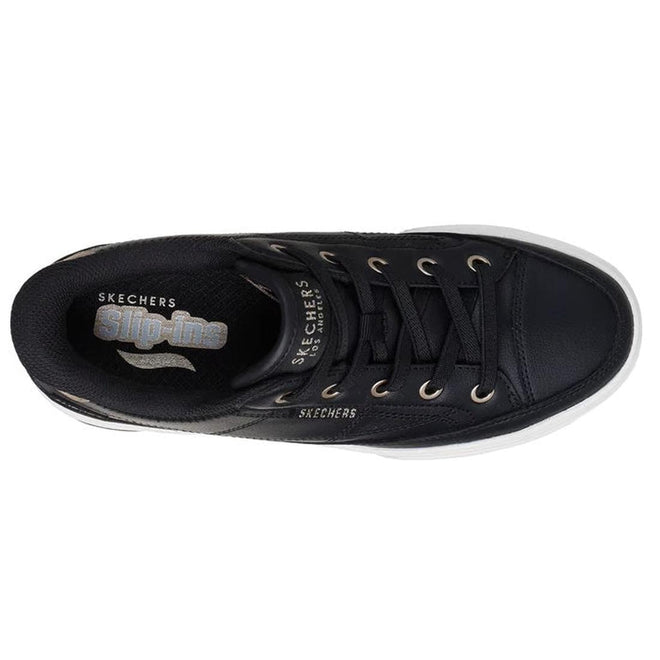 Top view of the Skechers Arch Fit-Arcade Catch Ya There Sneaker Black, a slip-on with black laces, metallic eyelets, and a white sole. The insole and tongue feature visible Skechers Arch Fit logos and "Slip-ins" text., 52242, 199025086332, 199025086356, 199025086370, 199025086394, 52251