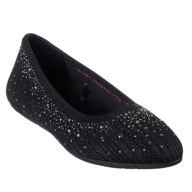 The Womens Skechers Cleo 2.0 Glitzy Daze Ballet Flat Black is a black knit flat with a rounded toe, adorned with rhinestones, eco-friendly materials, and STRETCH FIT in pink inside for comfort and style.